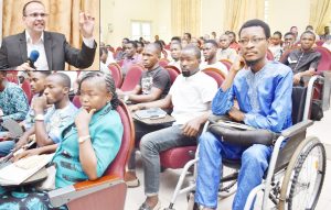 (Inset) Professor David Diaz from the Institute of Organic Chemistry, University of Regensburg, Germany delivering a Lecture while participants listen with rapt attention.