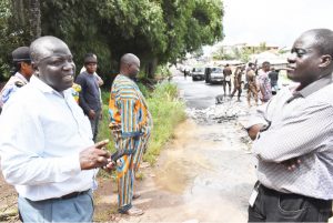 L-R The University’s Acting Director of Works, Mr. kehinde Ajiboye in a hearty chat with the Dean of Students Affairs, Professor Babatunde Idowu on curtailing the wreckage of the flooded portion of Camp/Alabata Road