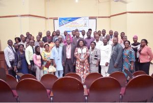 Principal Officers of the University, Resource Persons, Officials of CEADESE and participants in a group Photograph after the Workshop
