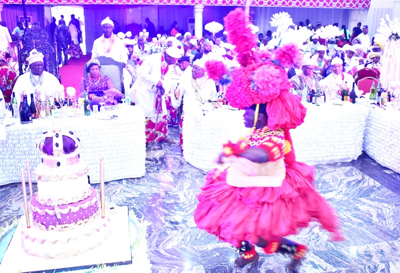 A cross-section of guests at the reception, admiring the rich cultural display of the Efik traditional dancer.