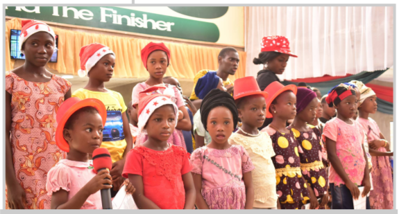 Children from the Chapel’s Missionary Field during their Bible recitations at the
Carol.
