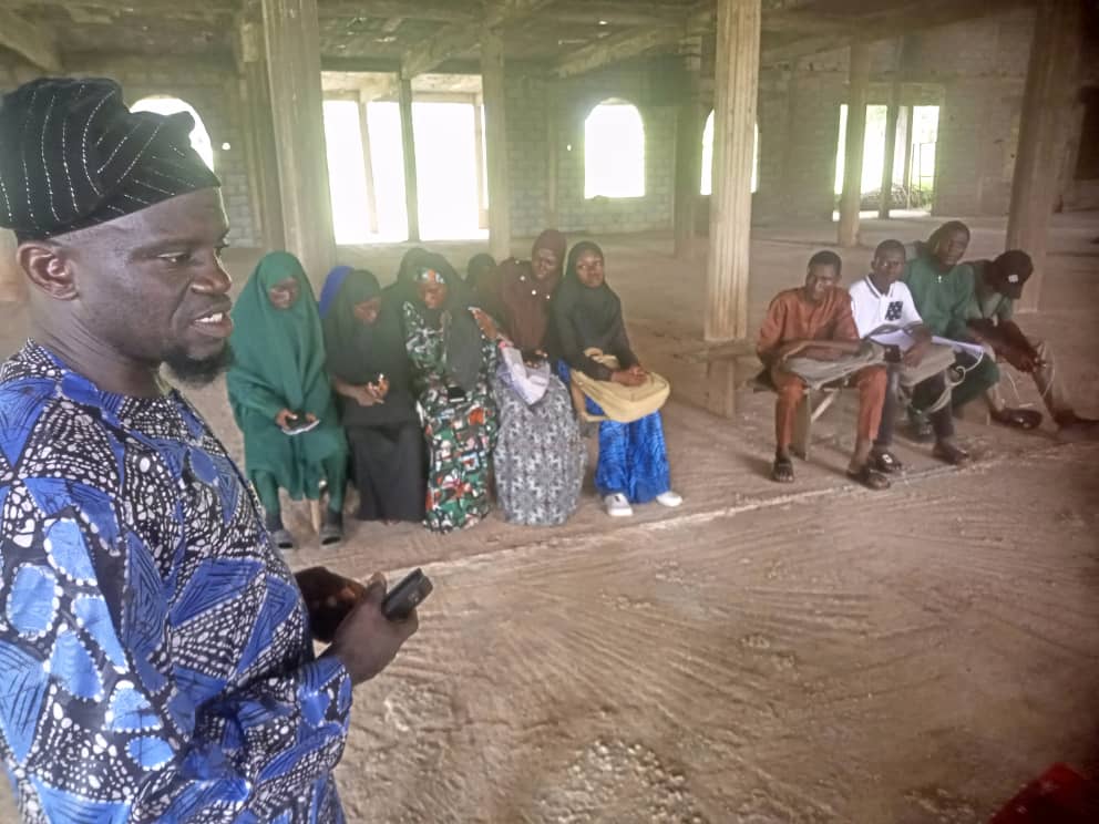 Representative of the BoT Chairman and the President, FUNAAMAA, Prof. Mutiu Busari addressing the beneficiaries at the University Mosque Credit: Olaoye Oyewole