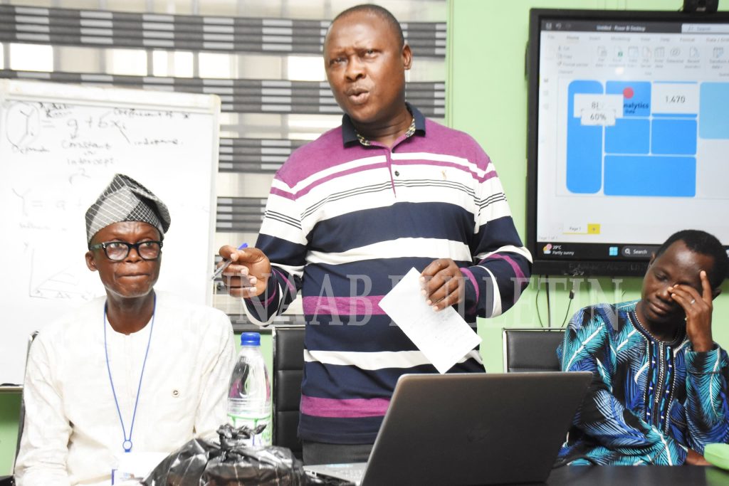 Representative of the Vice-Chancellor and the Director, CEADESE, Prof. Adeboye Fafiolu addressing the participants of the 2025 ADEPTI Training, while the Director, Directorate of Academic Planning, Prof. Olajide Sogunle with the Team Lead, DBI, Mr. Soji Fagbemi listen with rapt attention Credit: Gbolahan Lawal