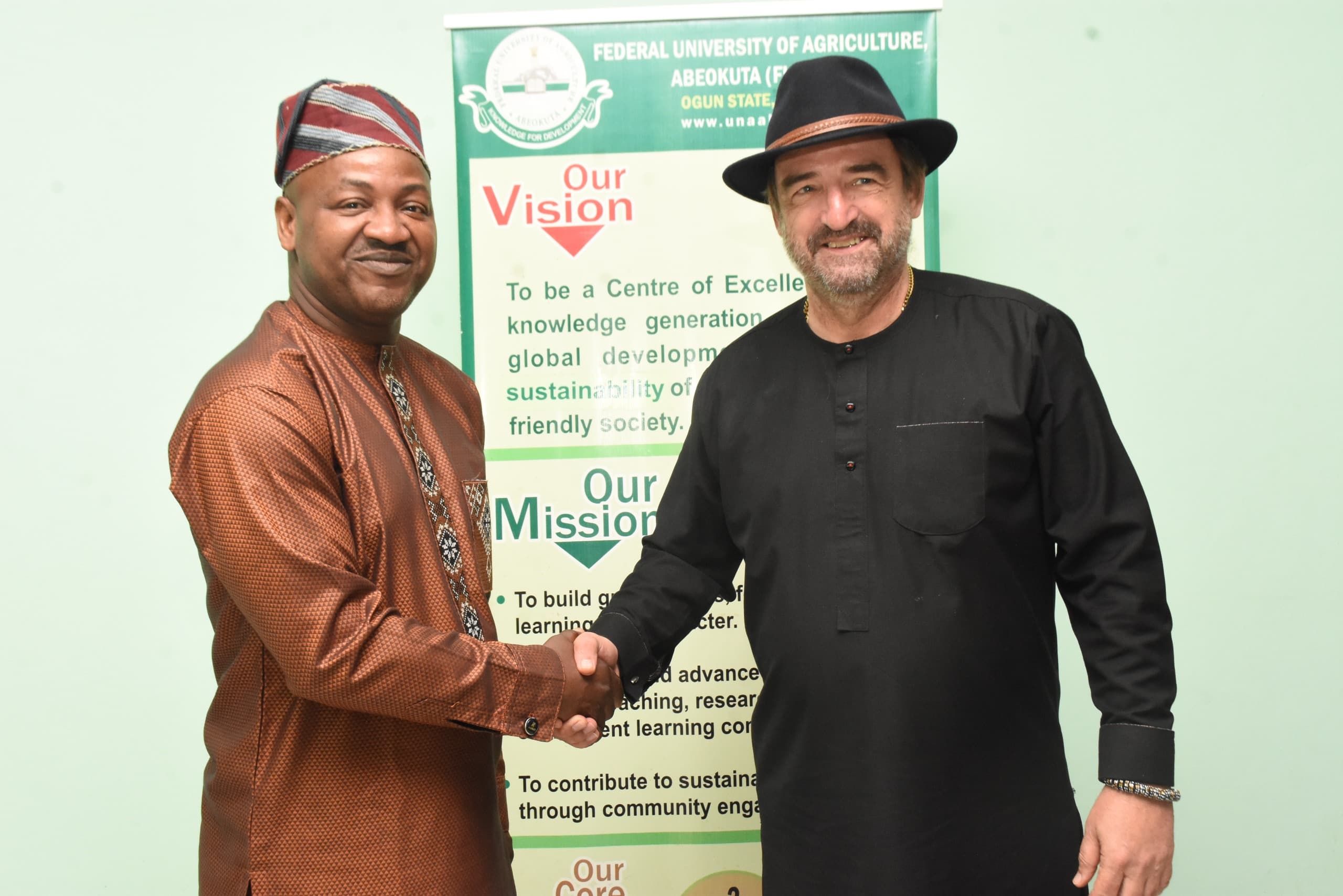 Representative of the Vice-Chancellor and the Deputy Vice-Chancellor, Development, Prof. Olawale Dairo welcoming the German Consul General in Lagos, Mr. Daniel Krull to FUNAAB Credit: Tofunmi Adebayo