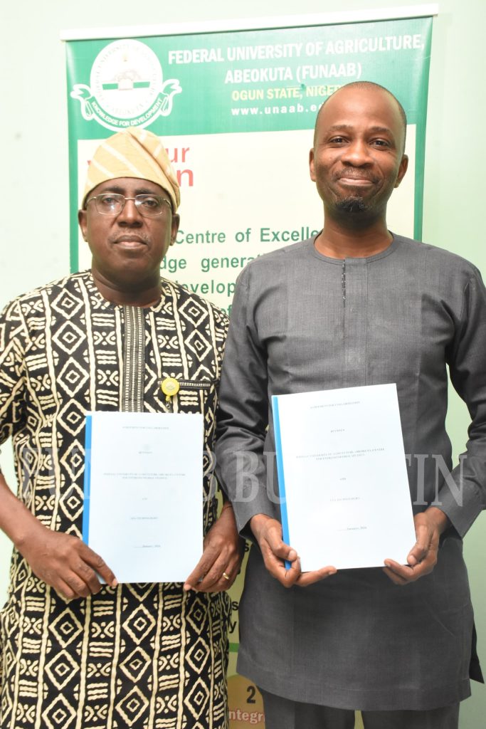 The Vice-Chancellor, Prof. Babatunde Kehinde (Left), with the Group Chief Executive Officer, GFA Technologies, Mr. Adebola Omololu after the brief MoU signing ceremony Credit: Gbolahan Lawal