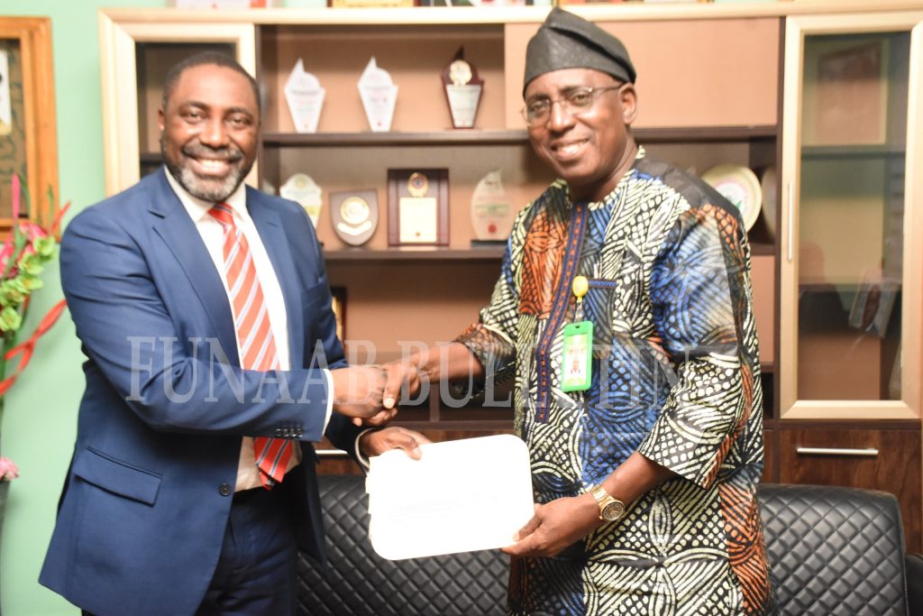 The Vice-Chancellor, Prof. Babatunde Kehinde (Right), receiving BTH's souvenir from Prof. Kayode Adekunle during the meeting Credit: Gbolahan Lawal